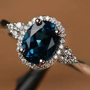 Dazzling 2 carat Blue Oval Lab Created Blue Gemstone & Cubic Zirconia Ring
